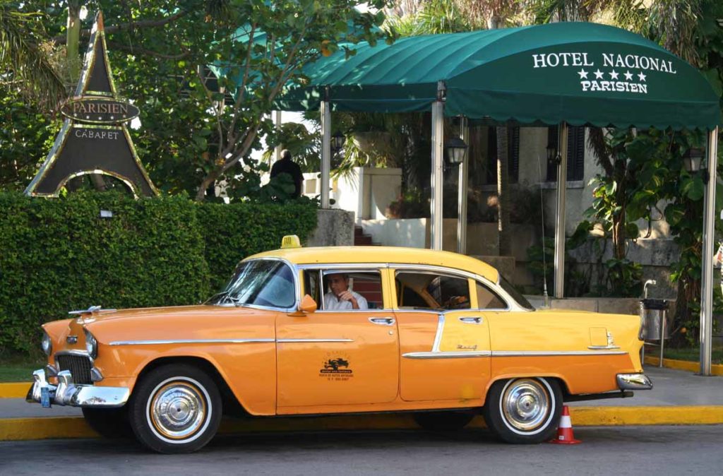 Cuba-Havana-beautiful-yellow-old-car-taxi