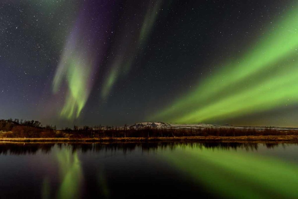 Iceland-Northern-Lights-Pingellir-over-lake