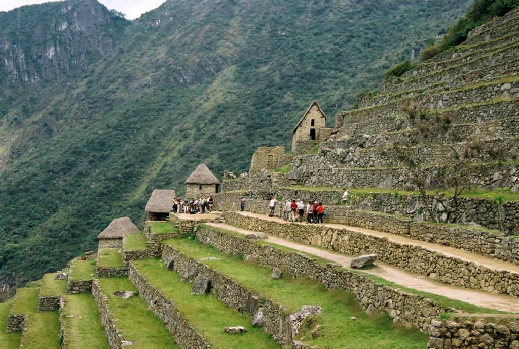 Peru-Machu-Picchu-walking-along-terraces