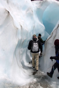 Fox-Glacier-heli-hike-walking-through-ice-cave