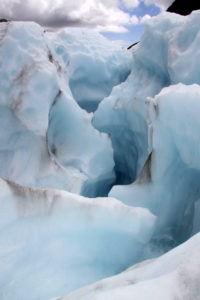 Fox-Glacier-heli-hike-deep-crevasse-blue-ice