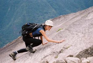 Huaynu-Picchu-hike-climbing-up-rock