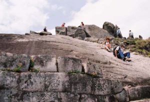 Huaynu-Picchu-hike-slide-down-rock