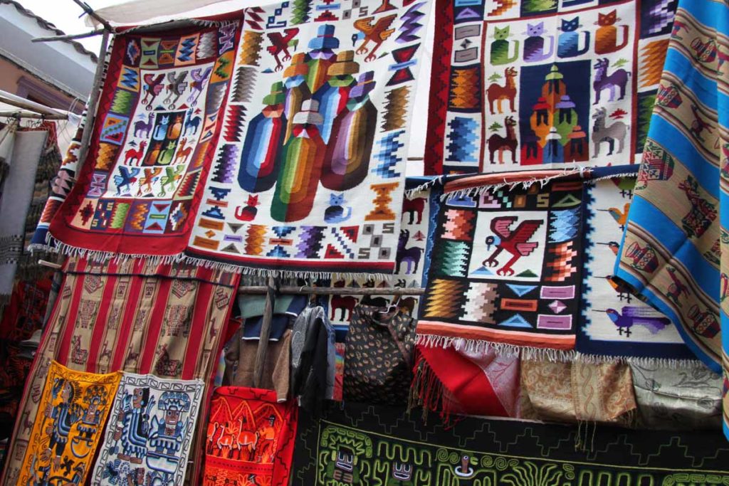Pisac-Peru-Sunday-market-colorful-textiles