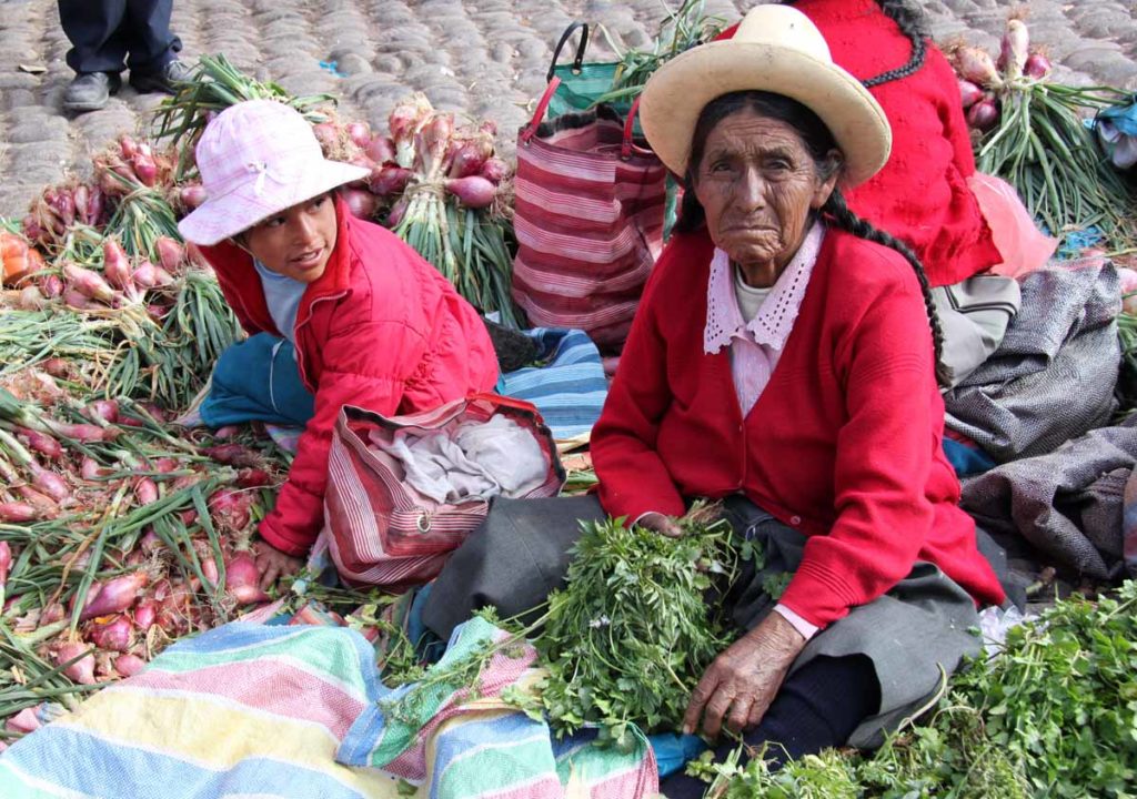 Pisac-Peru-Sunday-market-vegetable-seller