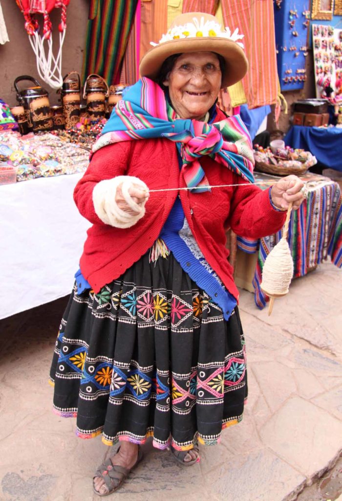 Pisac-Peru-older-woman-with-spool