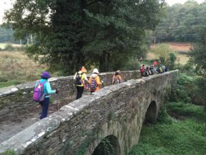 spain-camino-sarria-stone-bridge-filled-with-pilgrims