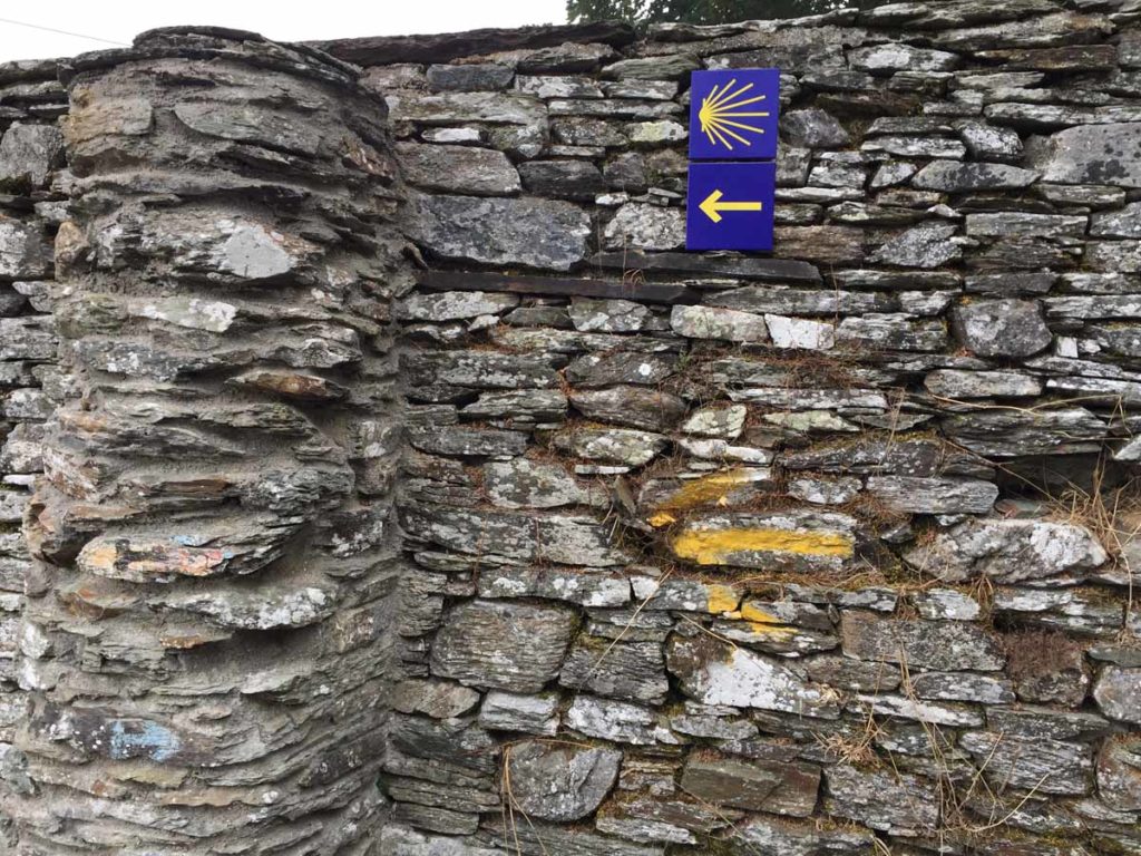 spain-camino-de-santiago-yellow-arrow