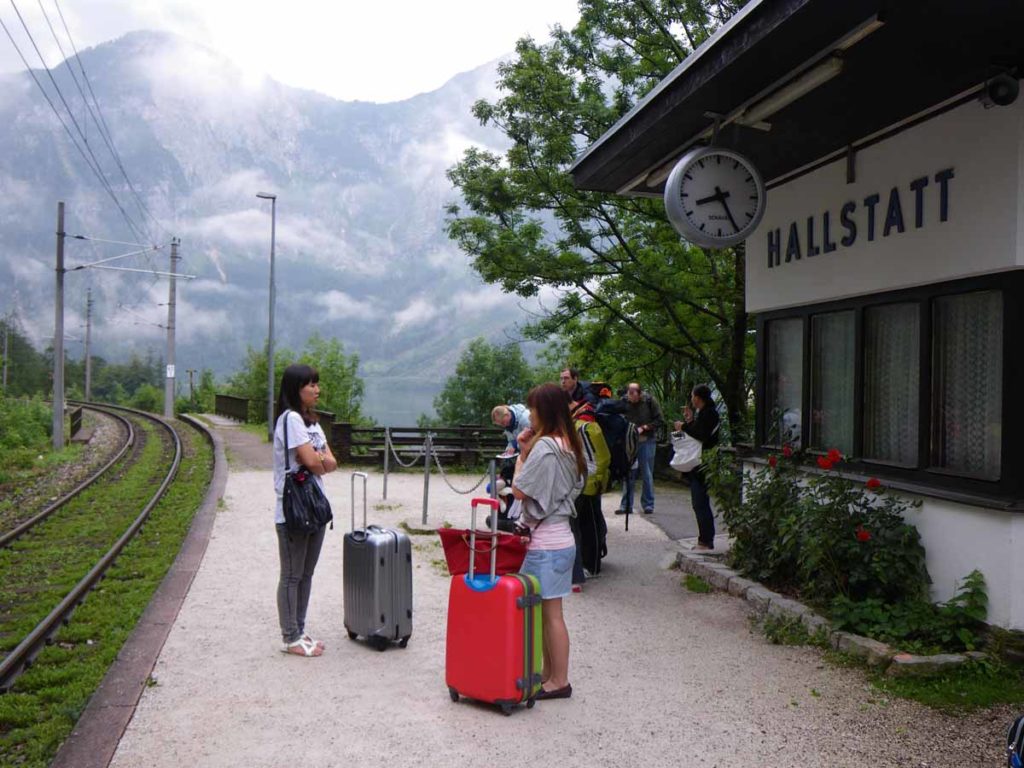 austria-hallstatt-train-station-people-waiting