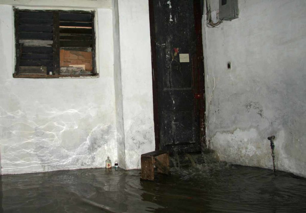 Havana-Cuba-rainstorm-water-coming-in-front-door