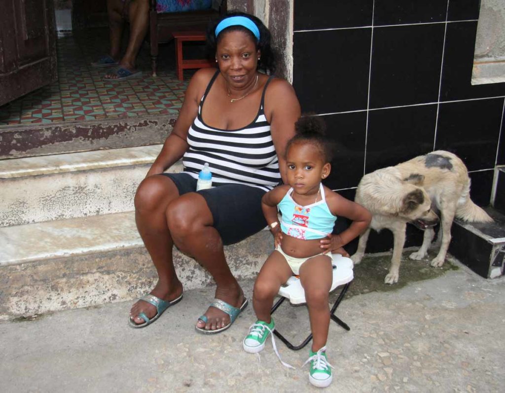 Havana-Cuba-maria-granddaughter-eliany-sidewalk