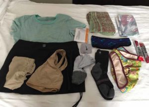 camino-clothes-removing-from-backpack
