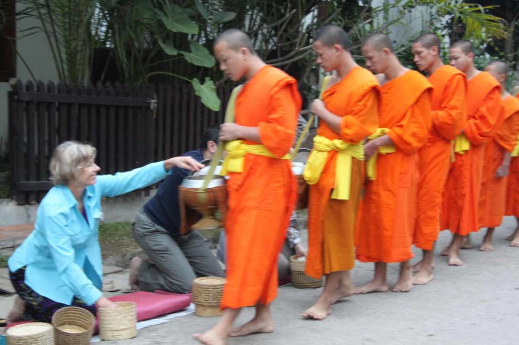 Laos-Luang-prabang-monks-janet-giving-alms