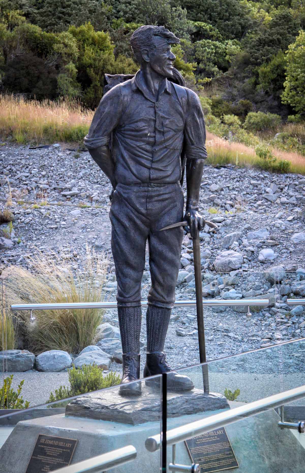 A statue of Sir Edmund Hillary is situated at the Aoraki/Mount Cook Village with views in the background of Mount Cook which he climbed in 1948