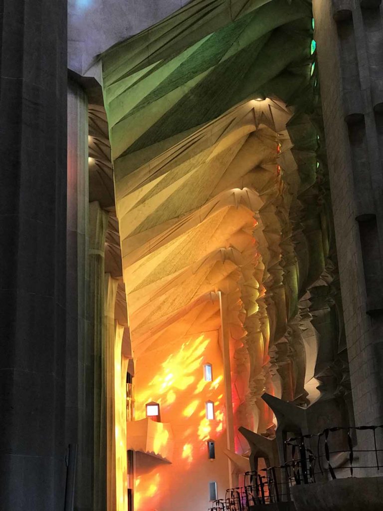 barcelona-sagrada-familia-afternoon-light-through-stained-glass-oranges