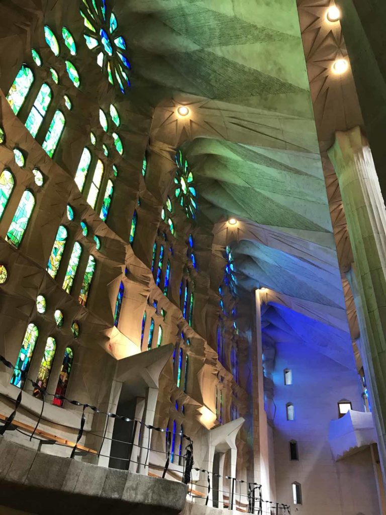 barcelona-sagrada-familia-afternoon-light-through-stained-glass-blues-greens