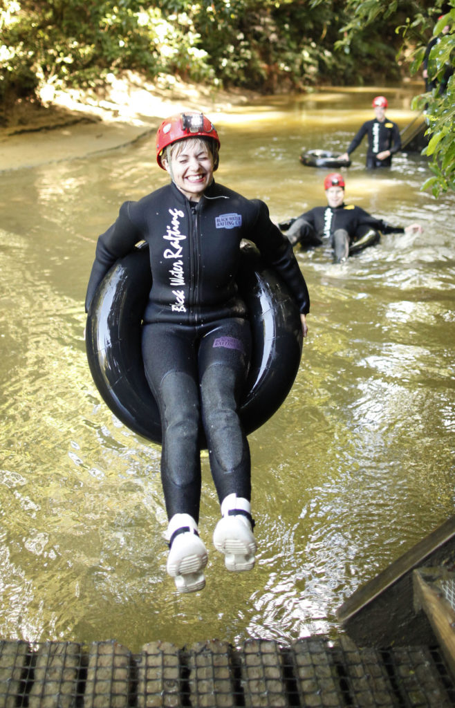 waitomo-caves-black-water-rafting-waterfall-jump-practice