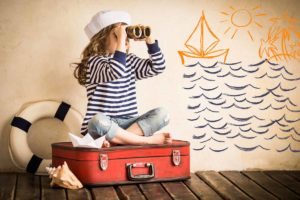girl-on-suitcase-maritime