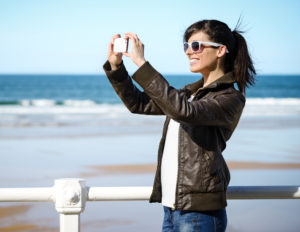 girl-taking-photo-with-phone