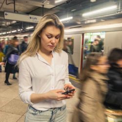 woman-on-phone-metro-station