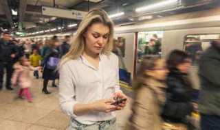 woman-on-phone-metro-station