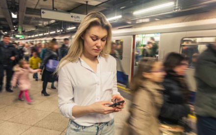 woman-on-phone-metro-station