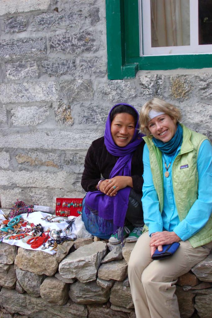 Nepal-trek-phakding-sherpa-farmhouse-local-woman-seller