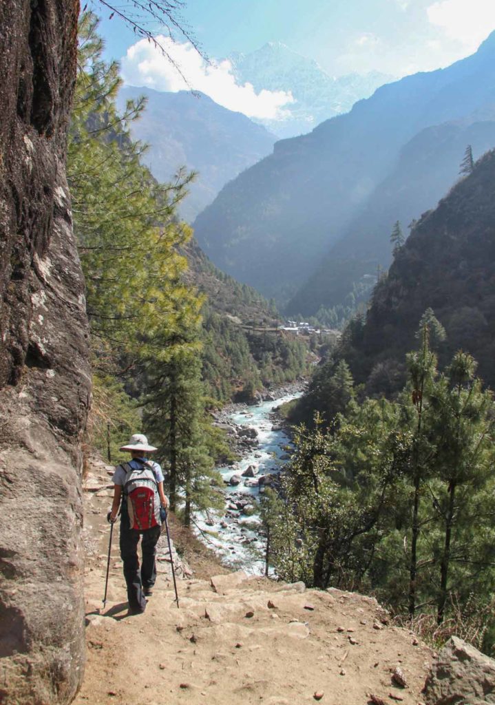 Nepal-trek-trekker-on-trail-river-valley