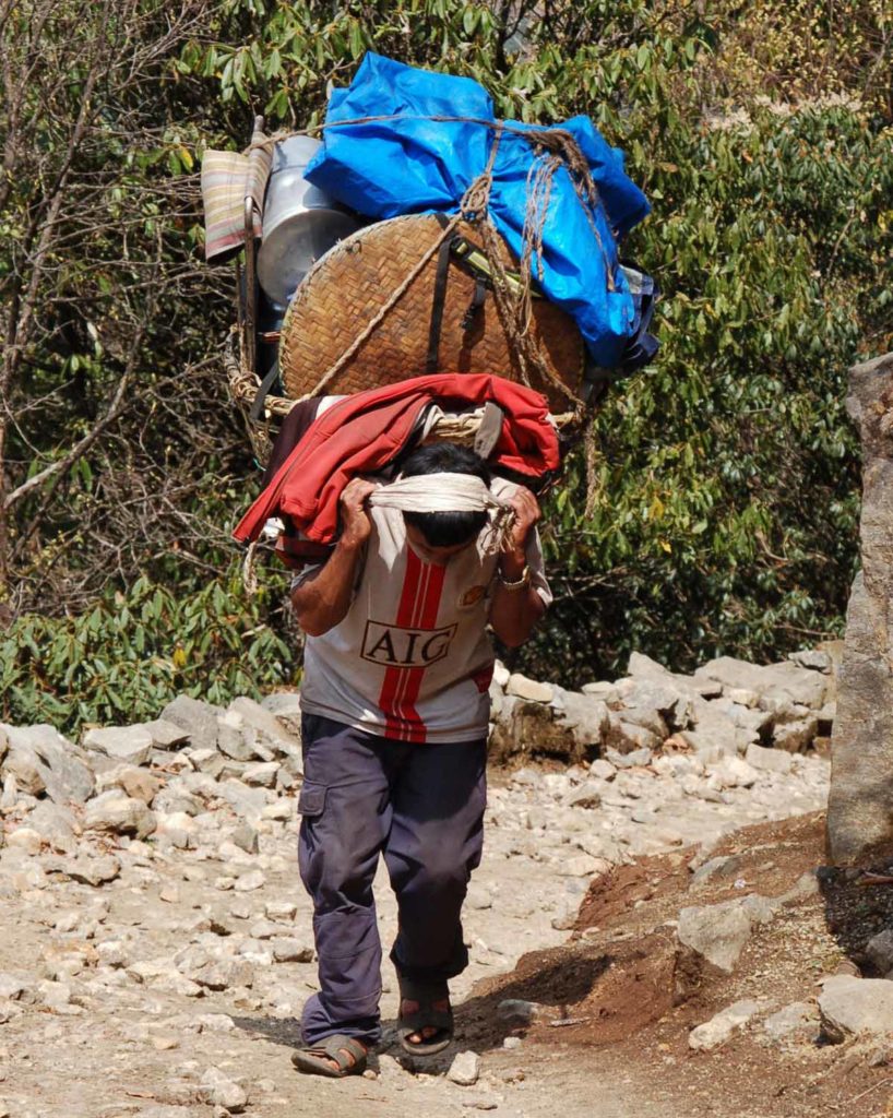 Nepal-trek-porter-with-heavy-load