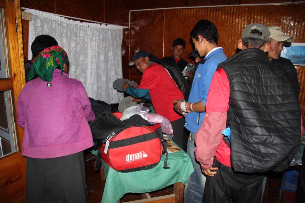 Nepal-trek-Lukla-donations-to-sherpa-team