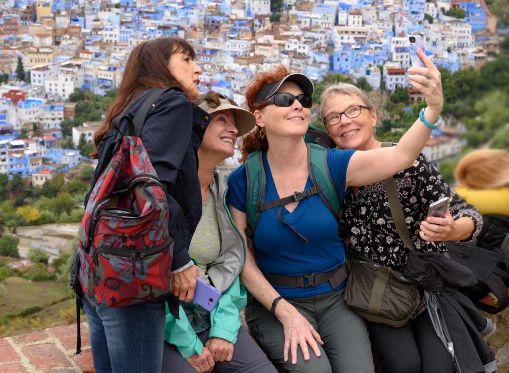 Morocco-Chefchaouen-women-taking-selfie-with-view