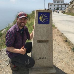 Spain-Finisterre-pilgrim-by-0km-marker